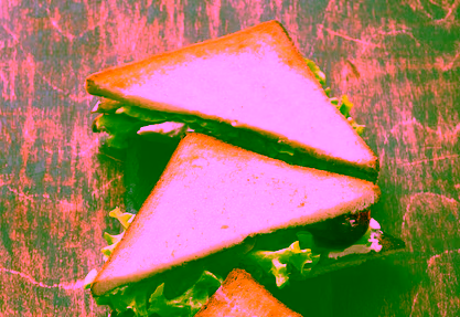 high angle triangle sandwiches with tomatoes 23 2148640141 e1746682382661